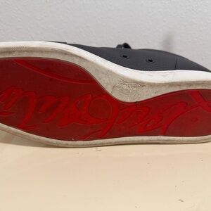 Christian Louboutin Black and Red Sneakers with Bold Sole